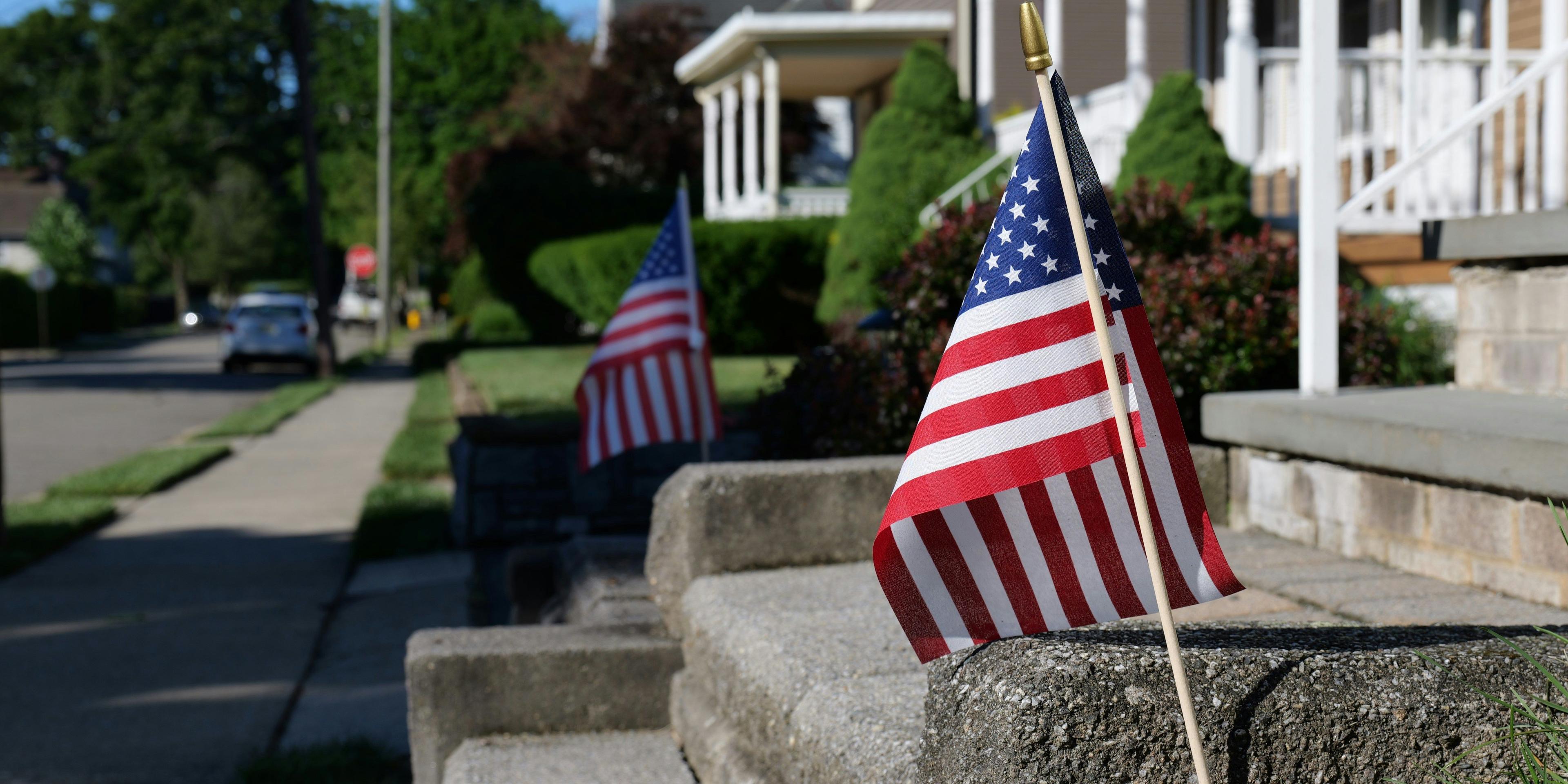 American flag in front yard.